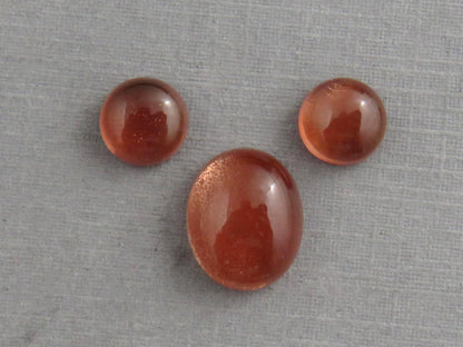 Oregon Sunstones Oval Cabochon Set | 7x7 pair and 11x9 single | 7+ carats | OSC332 - Oregon Sunstone - GemEnthusiast
