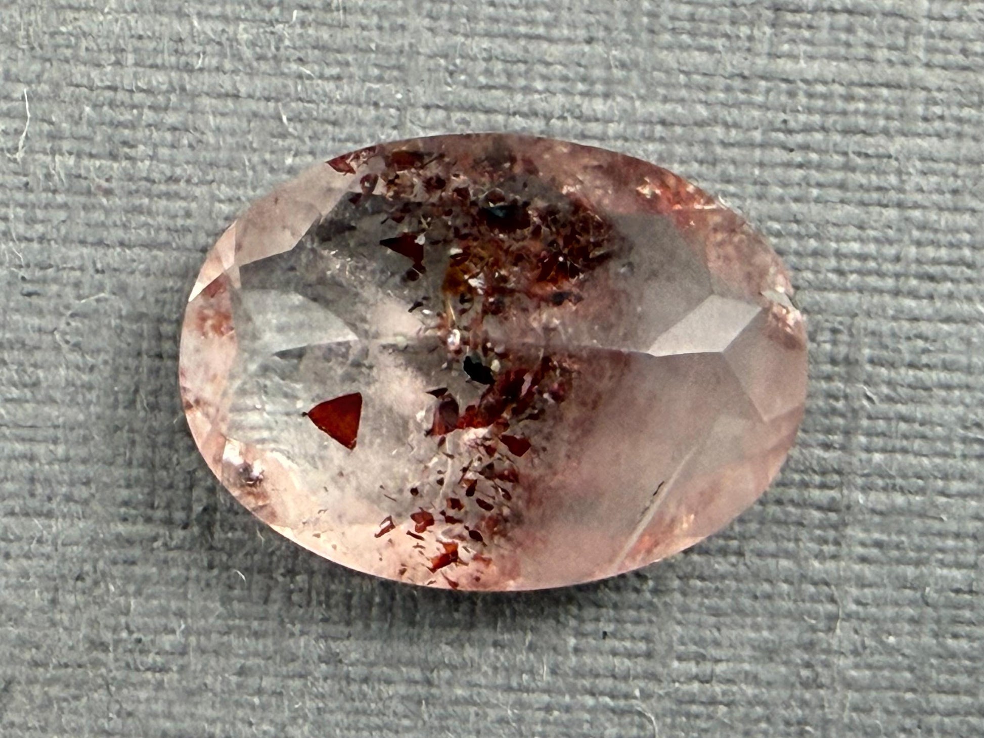 Fire Quartz with Hematite Flakes | 11x8mm | Oval Faceted Gemstone | QU533 - Fire Quartz - GemEnthusiast