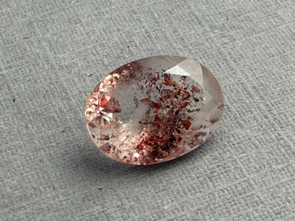 Fire Quartz with Hematite Flakes | 11x8mm | Oval Faceted Gemstone | QU533 - Fire Quartz - GemEnthusiast