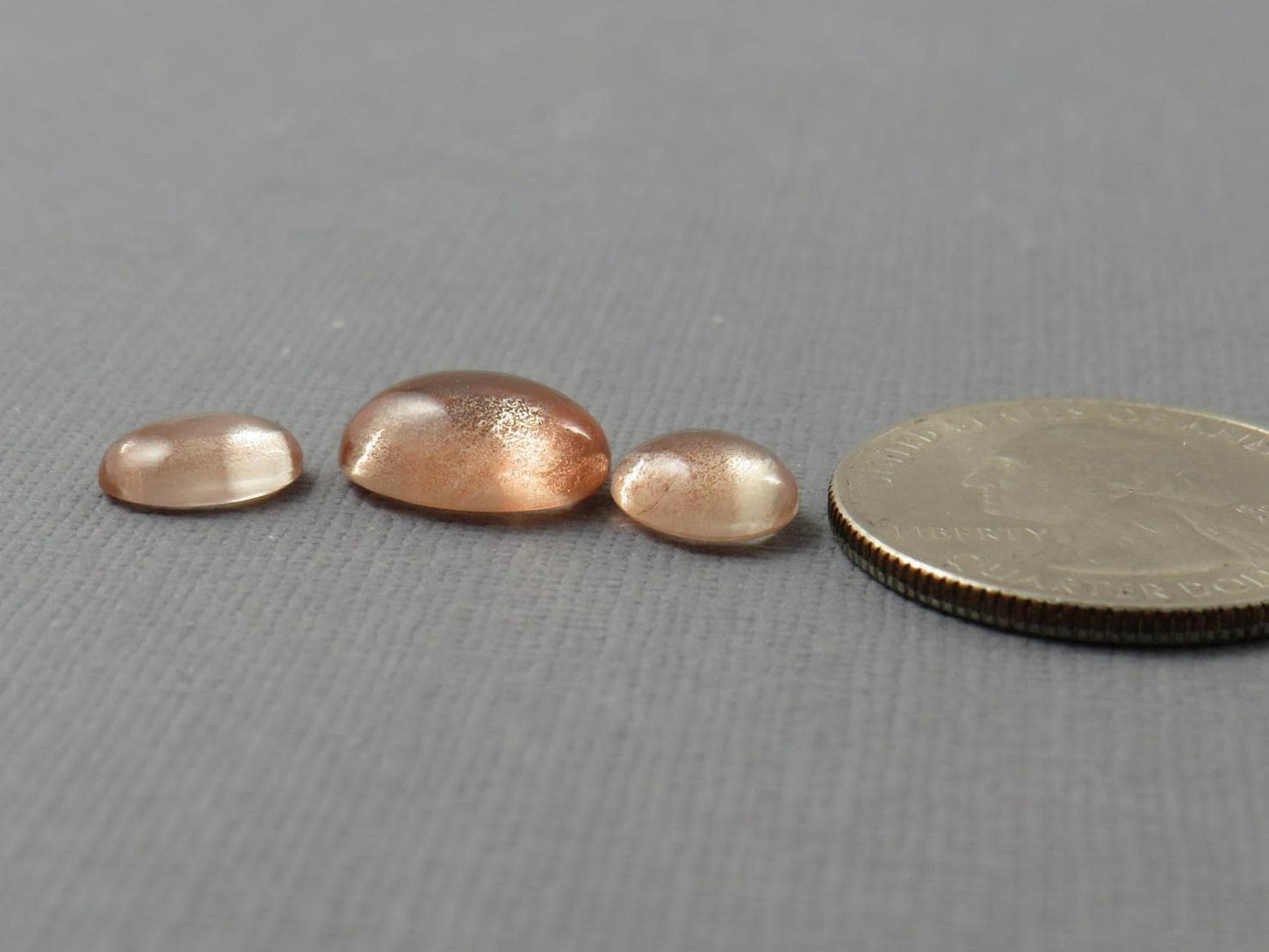 Oregon Sunstones Oval Cabochon Set | 9x7 pair and 12x9 single | 7.13 carats | OSC330 - Oregon Sunstone - GemEnthusiast