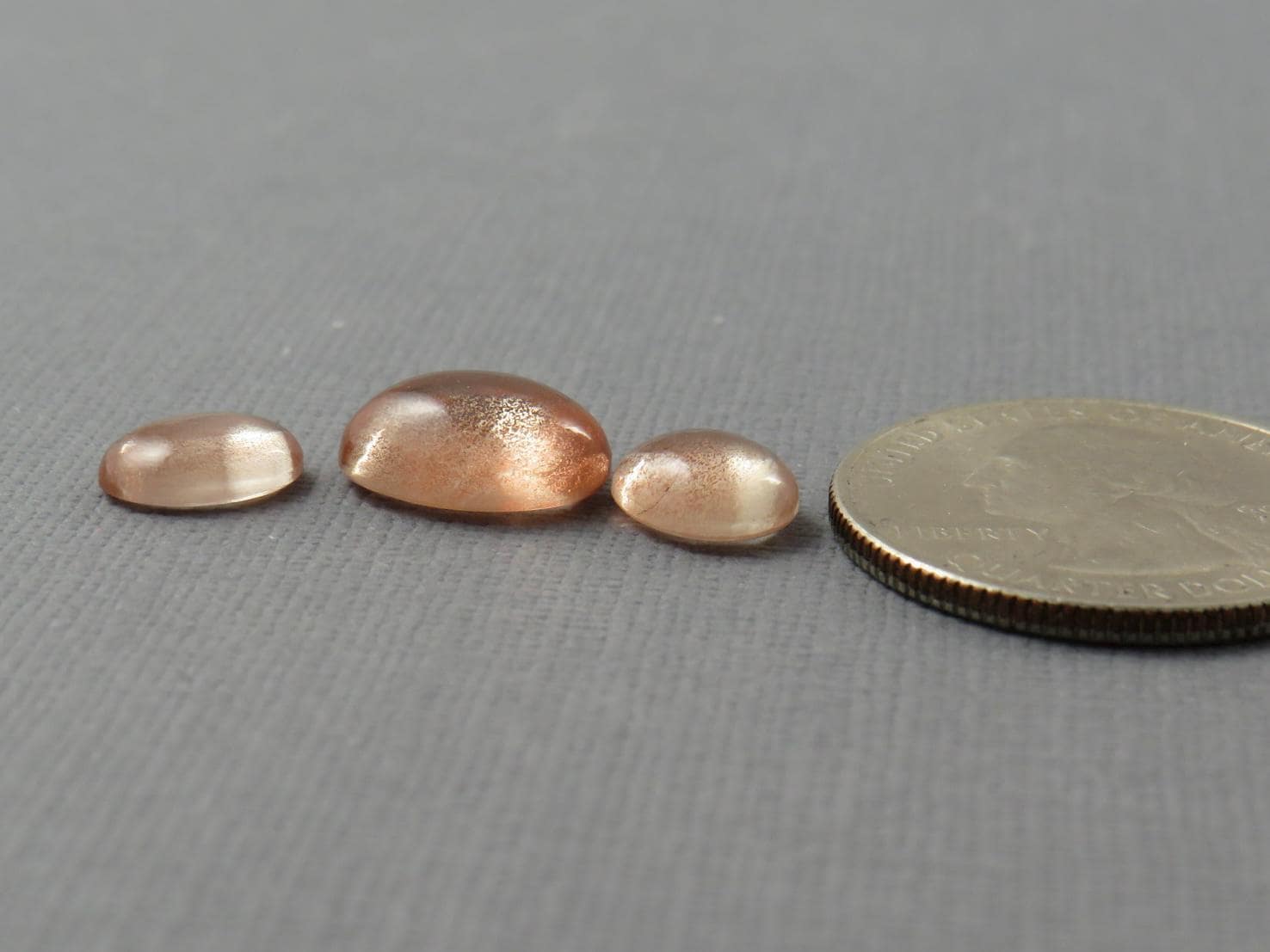 Oregon Sunstones Oval Cabochon Set | 9x7 pair and 12x9 single | 7.13 carats | OSC330 - Oregon Sunstone - GemEnthusiast
