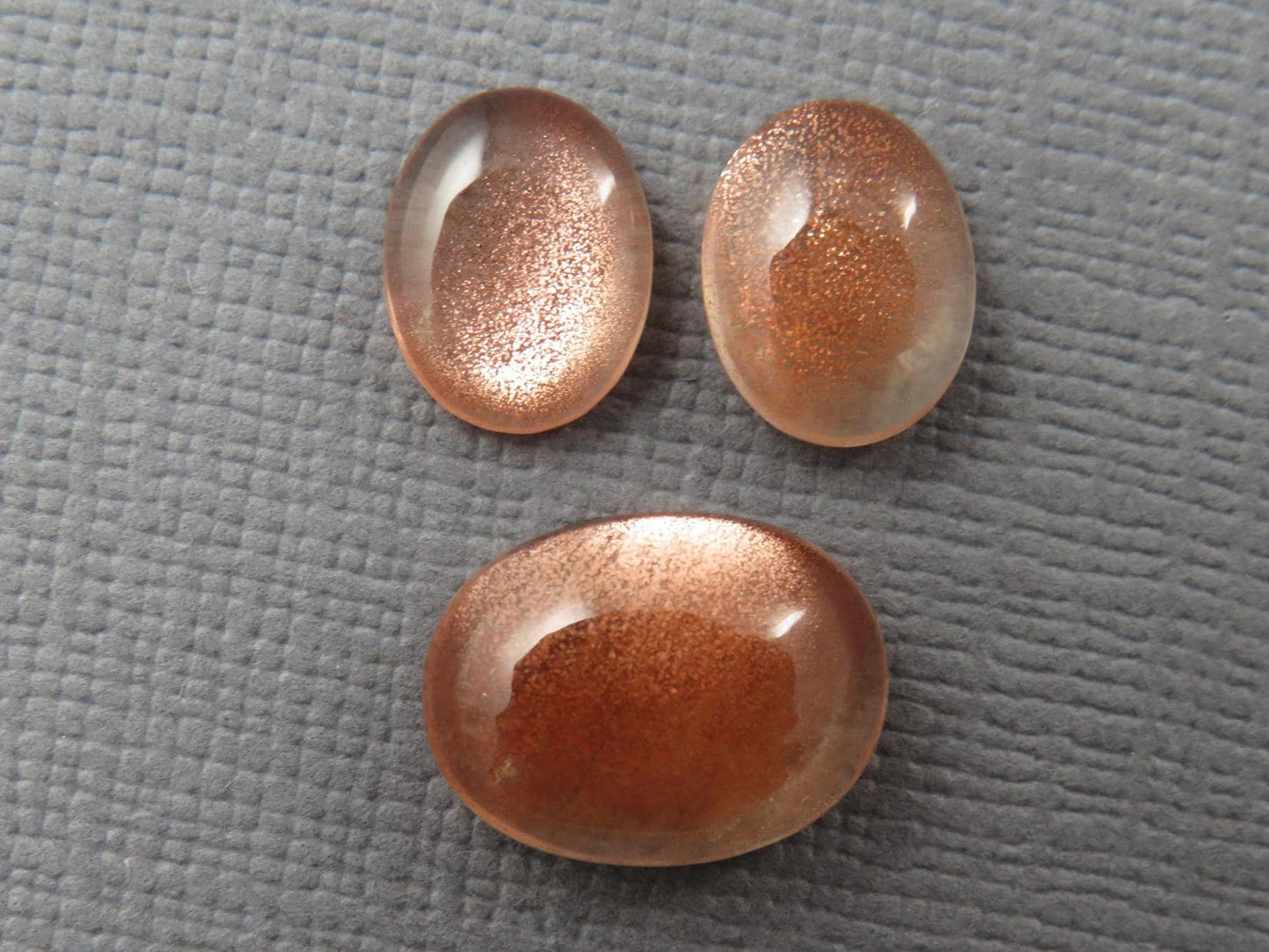 Oregon Sunstones Oval Cabochon Set | 9x7 pair and 12x9 single | 7.13 carats | OSC330 - Oregon Sunstone - GemEnthusiast