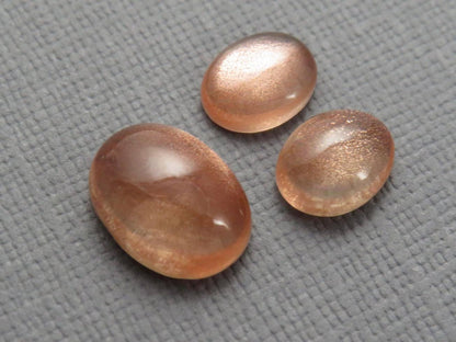 Oregon Sunstones Oval Cabochon Set | 9x7 pair and 12x9 single | 7.13 carats | OSC330 - Oregon Sunstone - GemEnthusiast