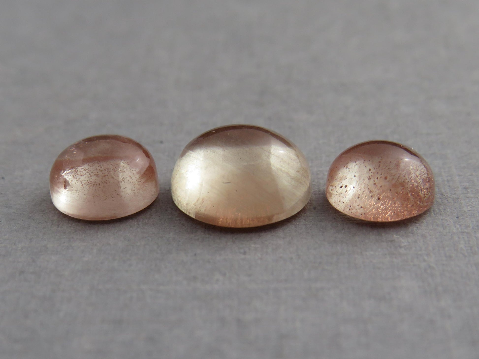 Oregon Sunstones Cabochon Set | 7mm pair and 9mm single Round Gemstones | 5.7 carats | OSC331 - Oregon Sunstone - GemEnthusiast