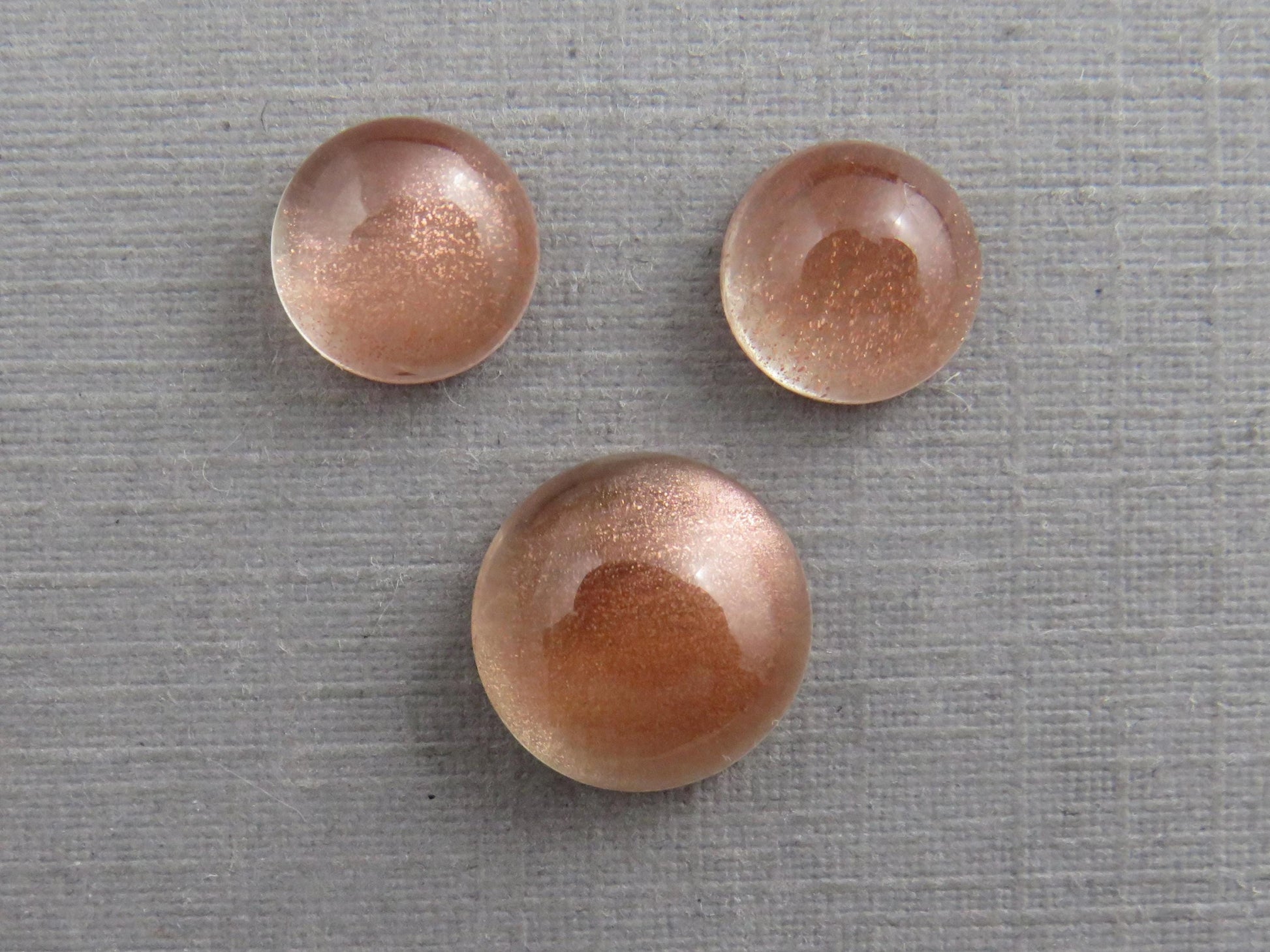 Oregon Sunstones Cabochon Set | 7mm pair and 9mm single Round Gemstones | 5.7 carats | OSC331 - Oregon Sunstone - GemEnthusiast