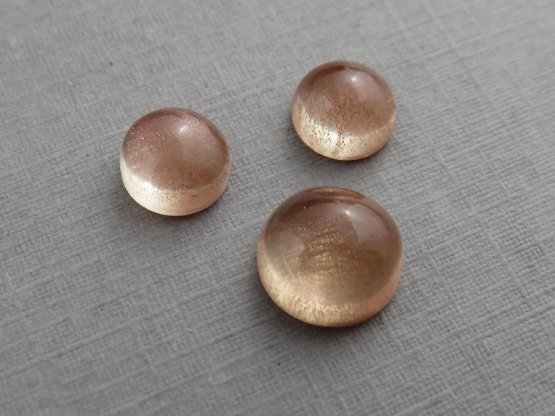Oregon Sunstones Cabochon Set | 7mm pair and 9mm single Round Gemstones | 5.7 carats | OSC331 - Oregon Sunstone - GemEnthusiast