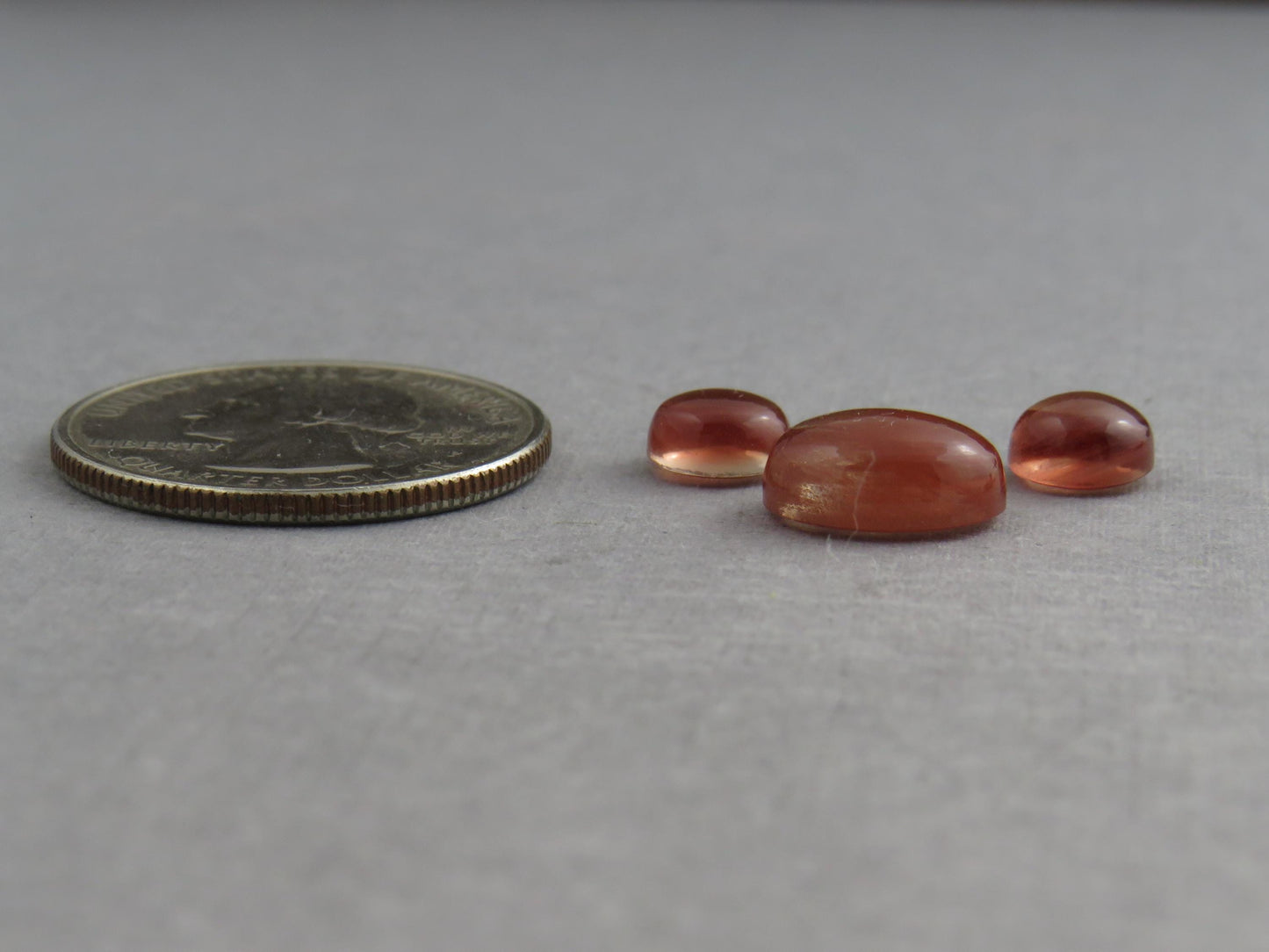 Oregon Sunstones Oval Cabochon Set | 7x7 pair and 11x9 single | 7+ carats | OSC332 - Oregon Sunstone - GemEnthusiast