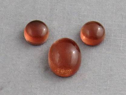 Oregon Sunstones Oval Cabochon Set | 7x7 pair and 11x9 single | 7+ carats | OSC332 - Oregon Sunstone - GemEnthusiast