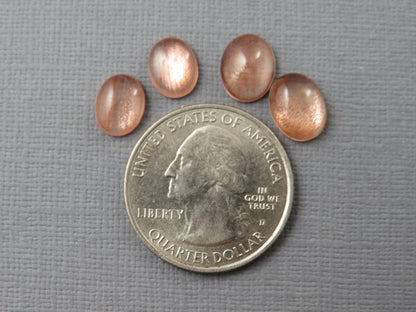 Oregon Sunstones Pairs with Schiller | 10x8 and 9x7 Oval Cabochons | OSC335 - Oregon Sunstone - GemEnthusiast