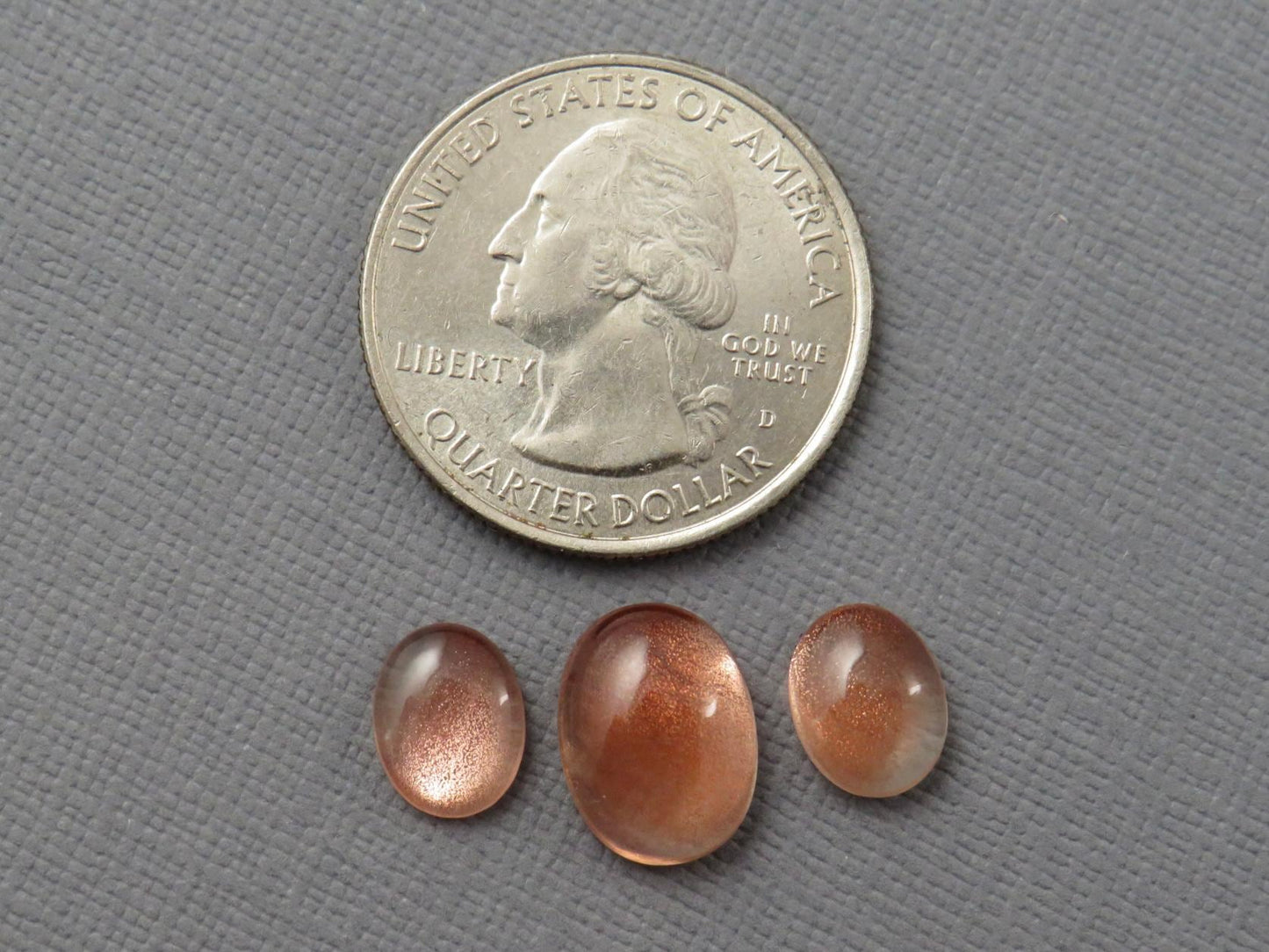Oregon Sunstones Oval Cabochon Set | 9x7 pair and 12x9 single | 7.13 carats | OSC330 - Oregon Sunstone - GemEnthusiast