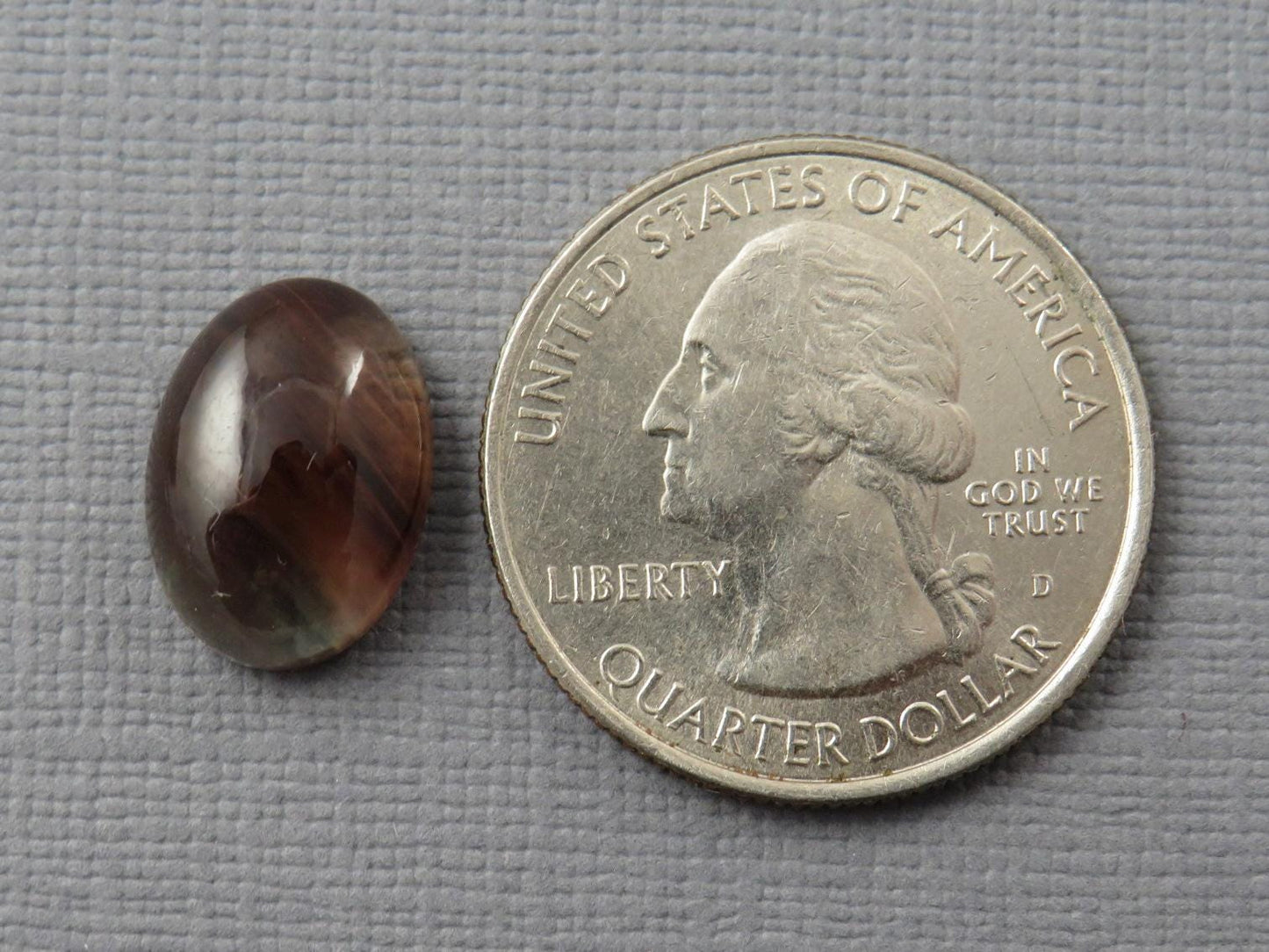 Bicolor Oregon Sunstone with Red and Green | 14x10mm Oval Cabochon | 6.14 carats | OSC338 - Oregon Sunstone - GemEnthusiast