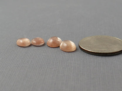 Oregon Sunstones Pairs with Schiller | 10x8 and 9x7 Oval Cabochons | OSC335 - Oregon Sunstone - GemEnthusiast