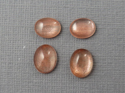Oregon Sunstones Pairs with Schiller | 10x8 and 9x7 Oval Cabochons | OSC335 - Oregon Sunstone - GemEnthusiast