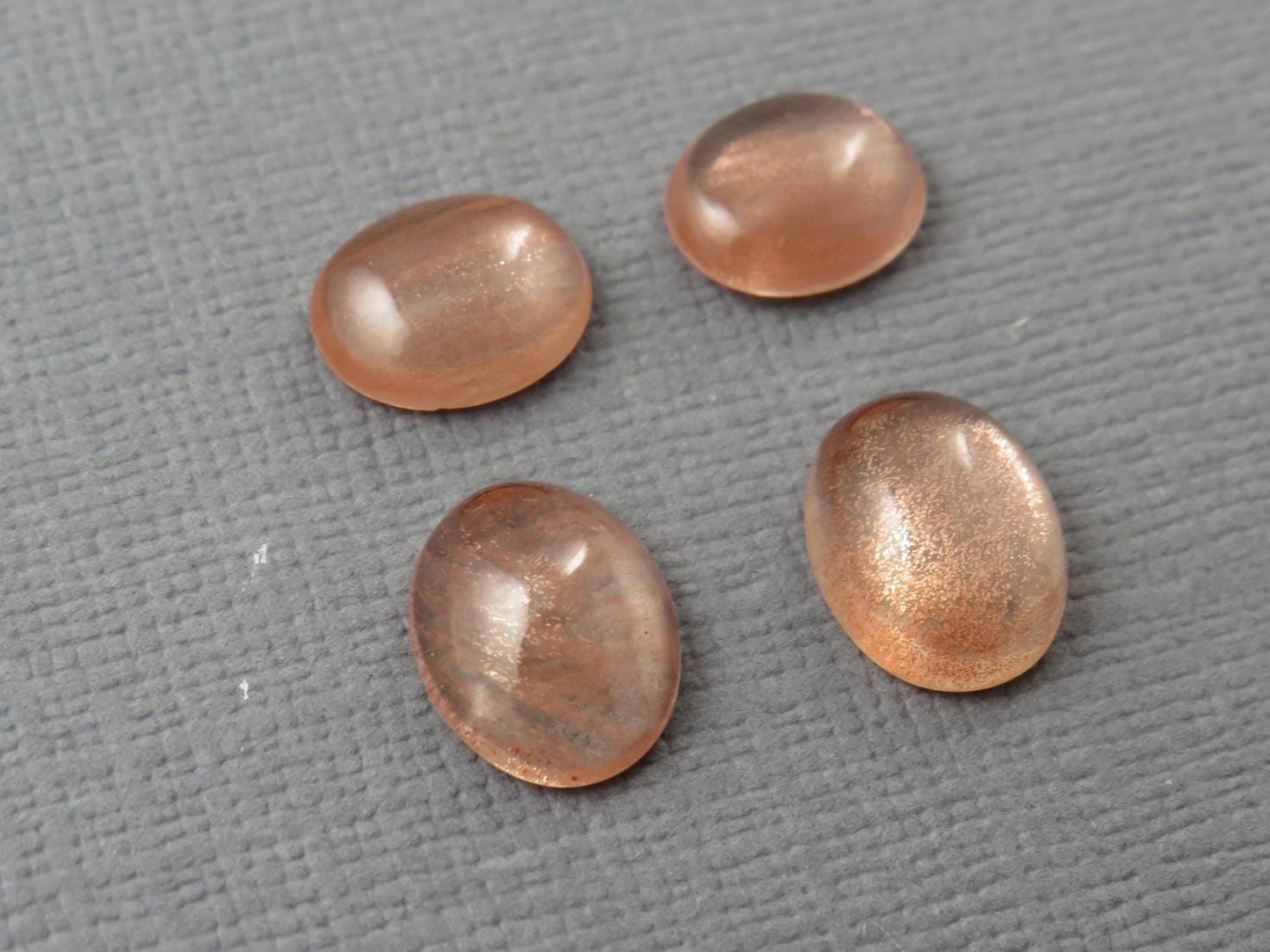 Oregon Sunstones Pairs with Schiller | 10x8 and 9x7 Oval Cabochons | OSC335 - Oregon Sunstone - GemEnthusiast
