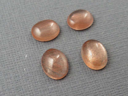 Oregon Sunstones Pairs with Schiller | 10x8 and 9x7 Oval Cabochons | OSC335 - Oregon Sunstone - GemEnthusiast