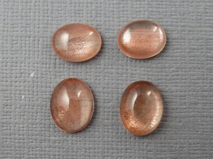 Oregon Sunstones Pairs with Schiller | 10x8 and 9x7 Oval Cabochons | OSC335 - Oregon Sunstone - GemEnthusiast