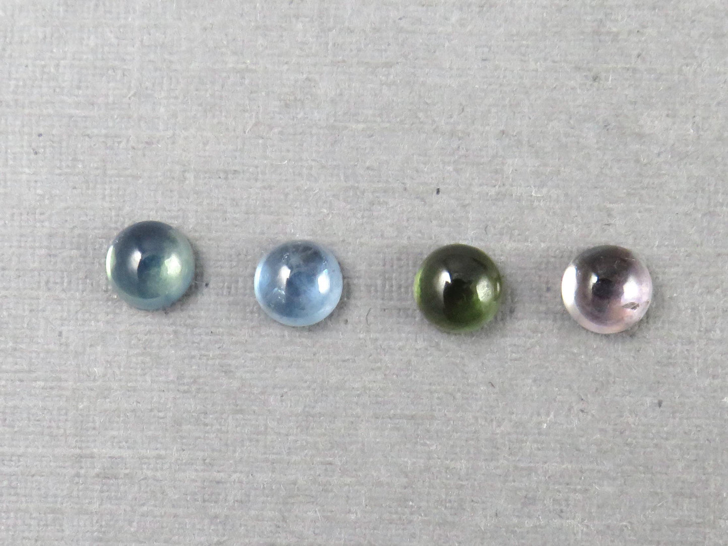 Montana Sapphire Cabochon - 4mm Round | Per Stone | Teal-Blue, Light Blue, Green & Pale Purple | SA305 - Montana Sapphire - GemEnthusiast