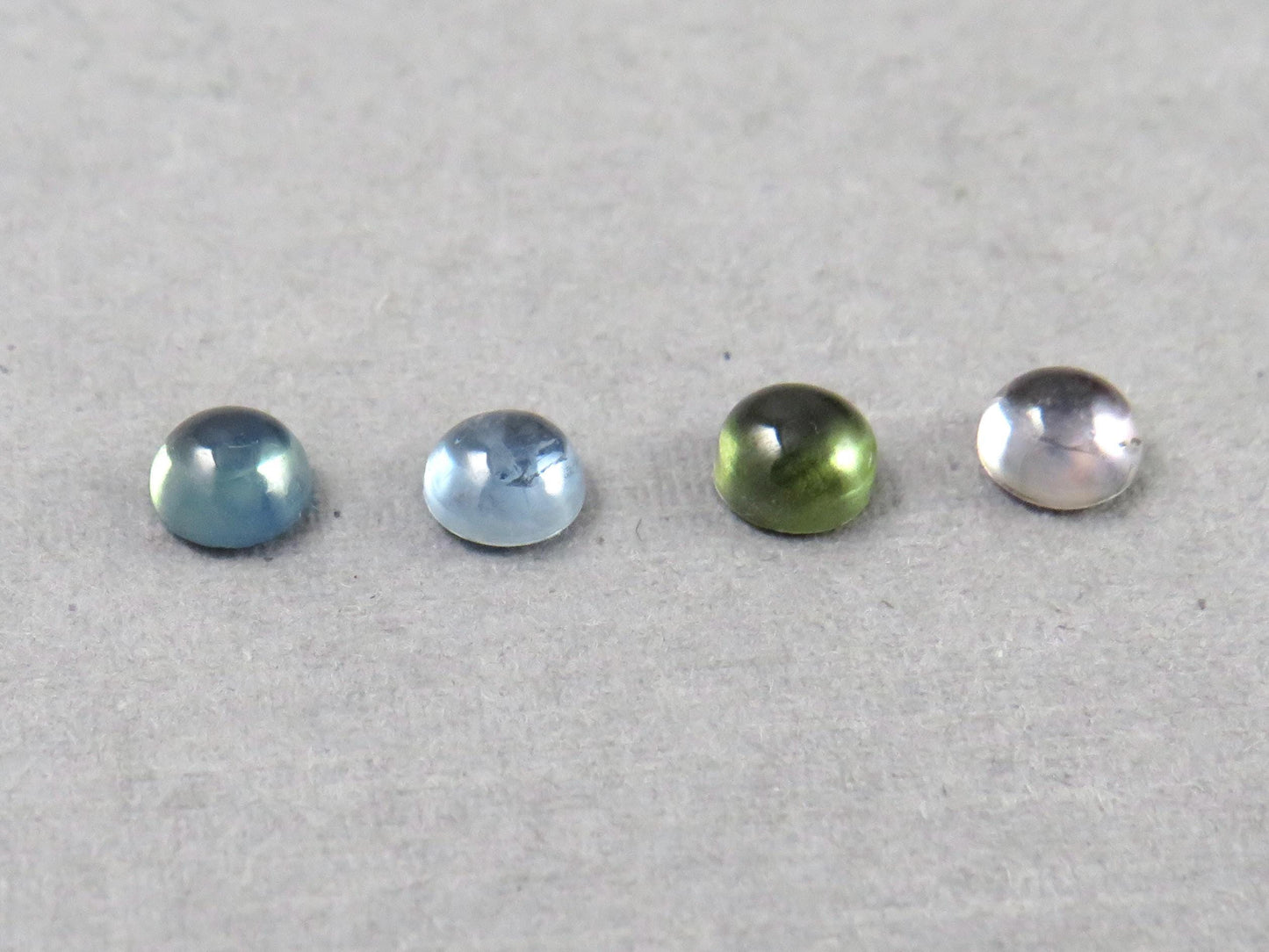 Montana Sapphire Cabochon - 4mm Round | Per Stone | Teal-Blue, Light Blue, Green & Pale Purple | SA305 - Montana Sapphire - GemEnthusiast