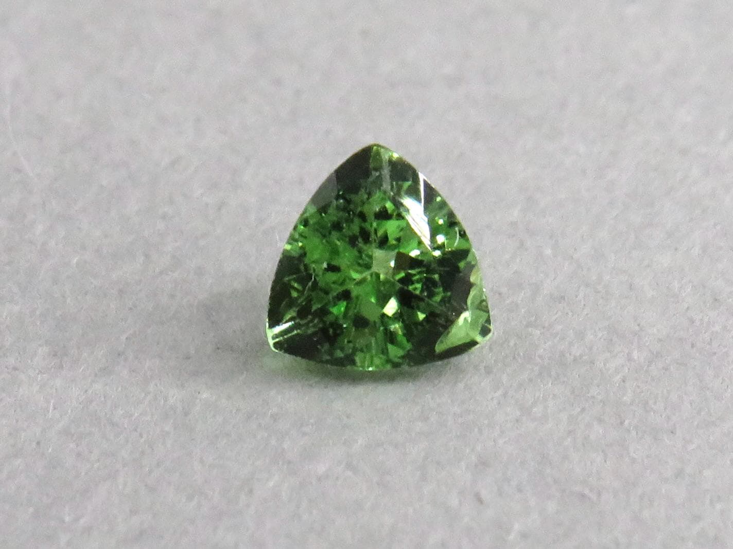 Fluorescent Grossular Garnet | 4.9mm Trillion | East Africa | GR106 - Grossular Garnet - GemEnthusiast
