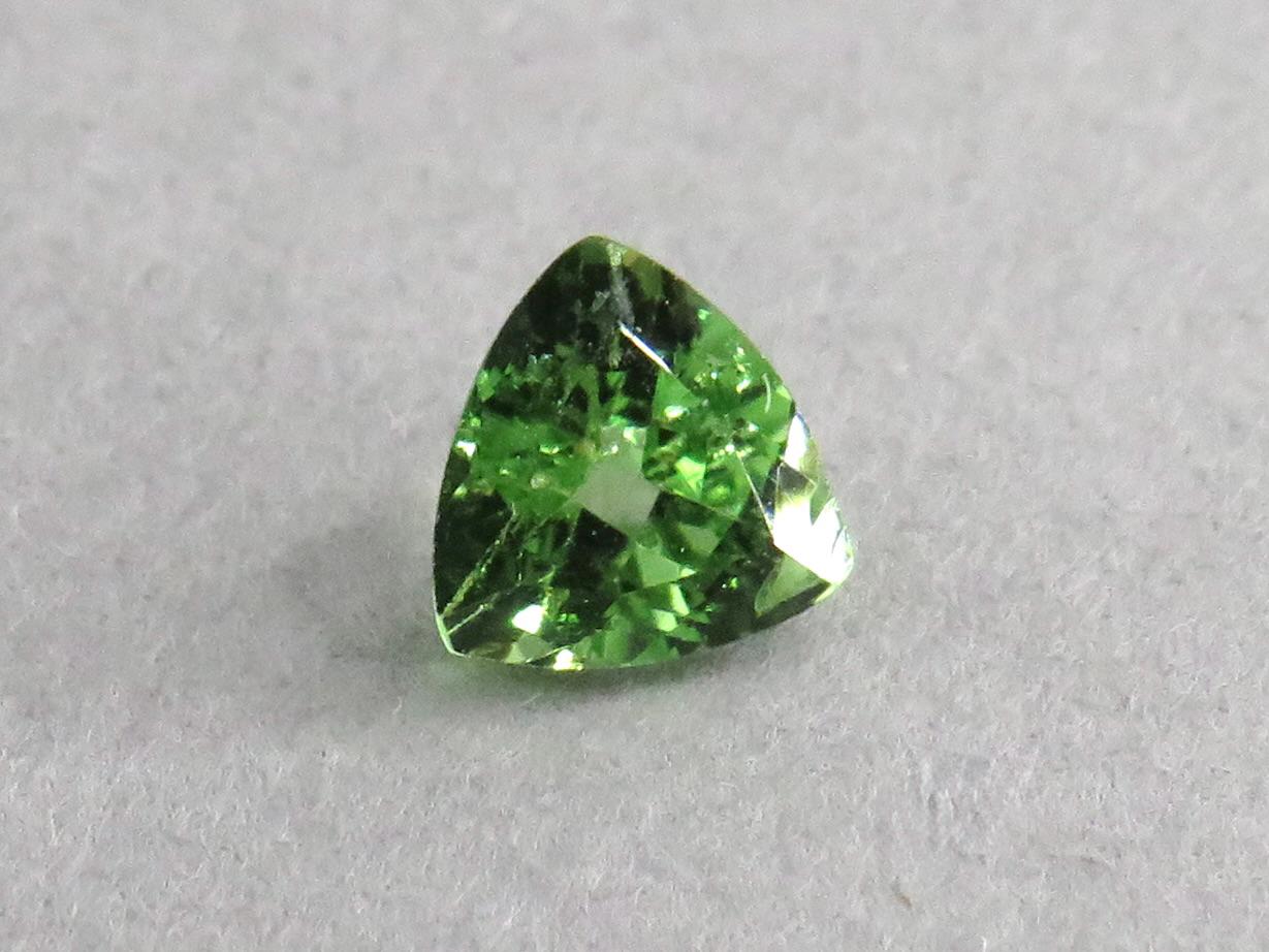 Fluorescent Grossular Garnet | 4.9mm Trillion | East Africa | GR106 - Grossular Garnet - GemEnthusiast