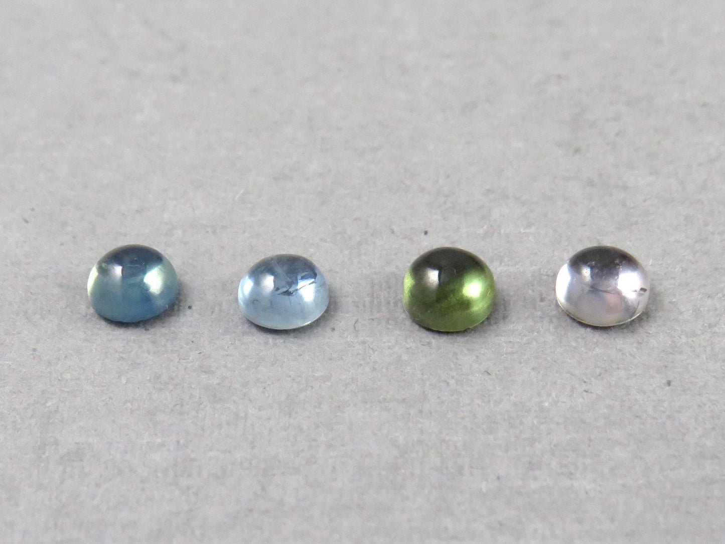 Montana Sapphire Cabochon - 4mm Round | Per Stone | Teal-Blue, Light Blue, Green & Pale Purple | SA305 - Montana Sapphire - GemEnthusiast
