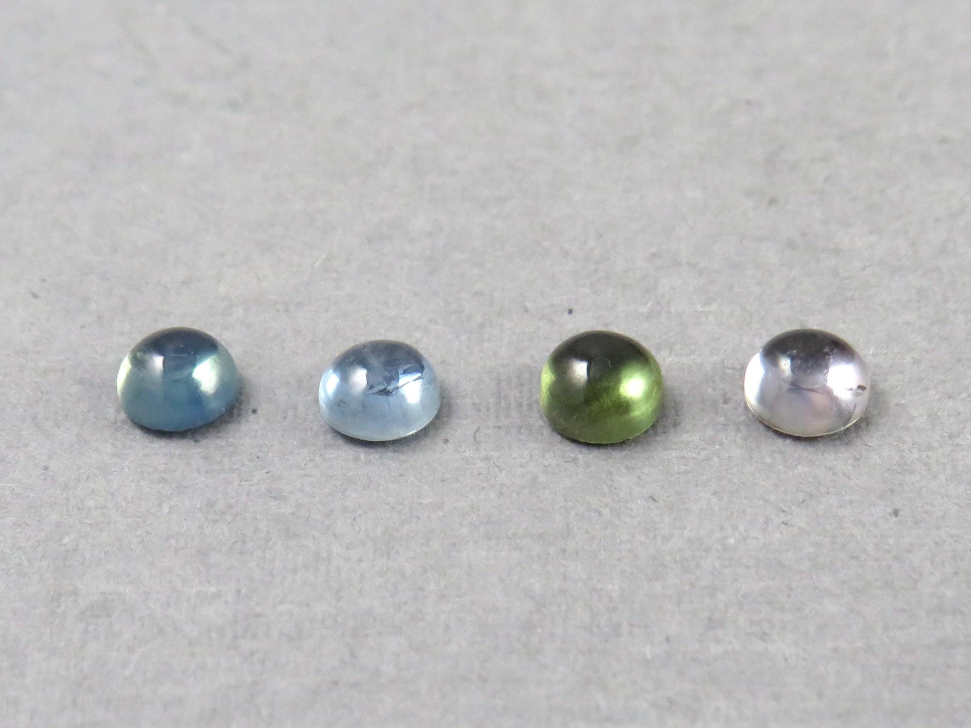 Montana Sapphire Cabochon - 4mm Round | Per Stone | Teal-Blue, Light Blue, Green & Pale Purple | SA305 - Montana Sapphire - GemEnthusiast