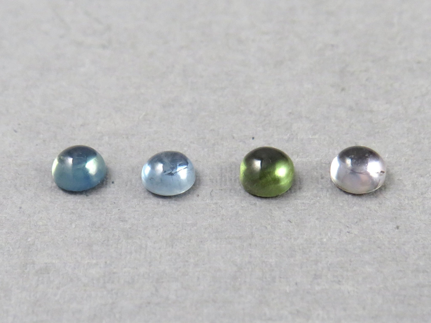 Montana Sapphire Cabochon — 4mm Round | Per Stone | Teal - Blue, Light Blue, Green & Pale Purple | SA305 - One of a Kind Cabochons - Gem Enthusiast