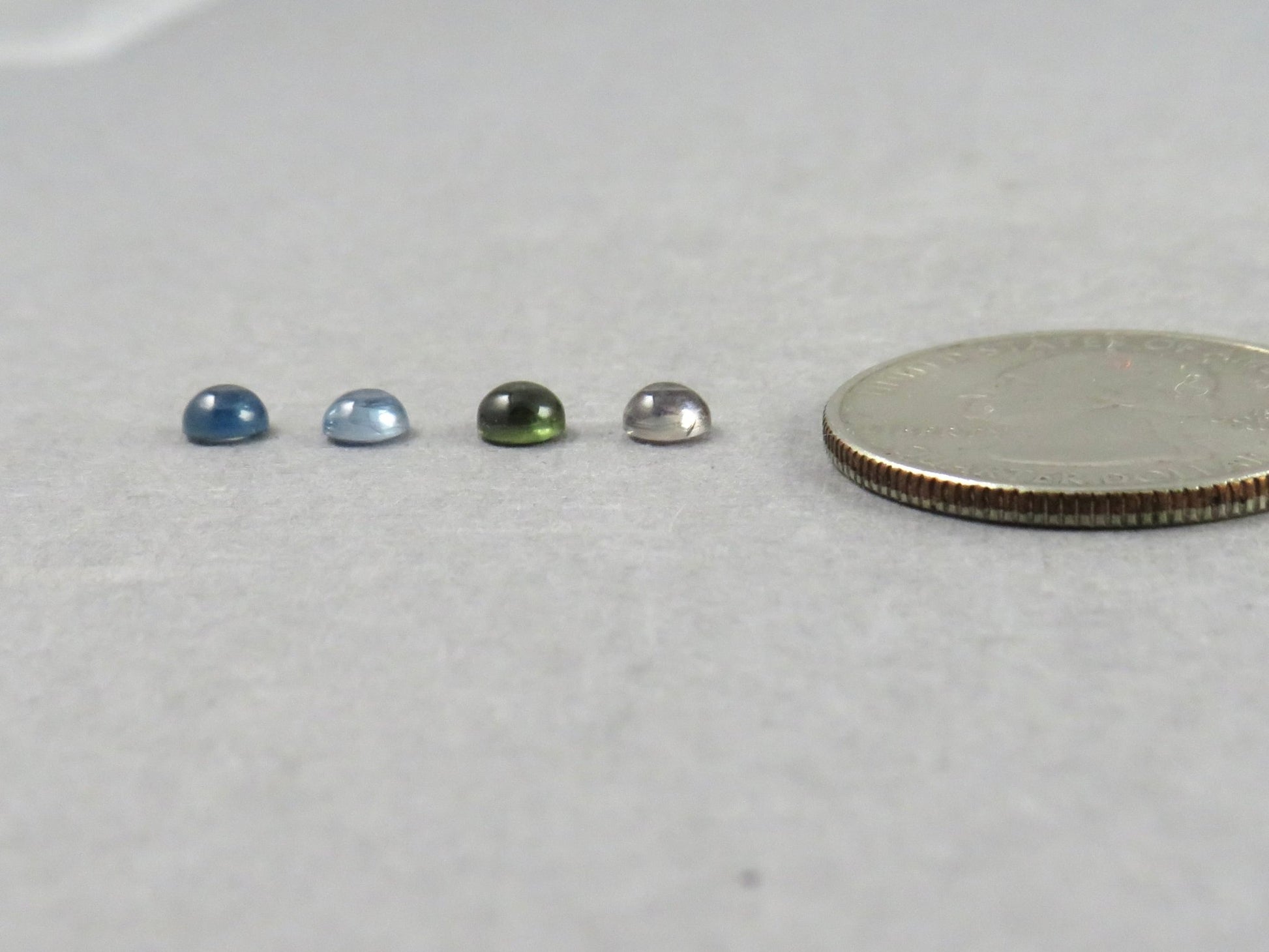 Montana Sapphire Cabochon — 4mm Round | Per Stone | Teal - Blue, Light Blue, Green & Pale Purple | SA305 - One of a Kind Cabochons - Gem Enthusiast