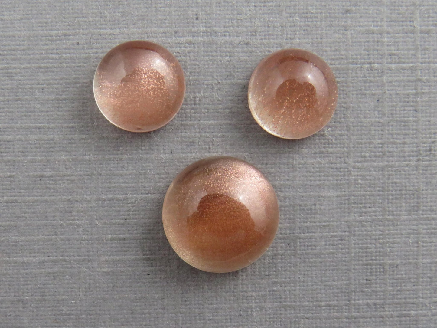 Oregon Sunstones Cabochon Set | 7mm pair and 9mm single Round Gemstones | 5.7 carats | OSC331 - Gem Enthusiast