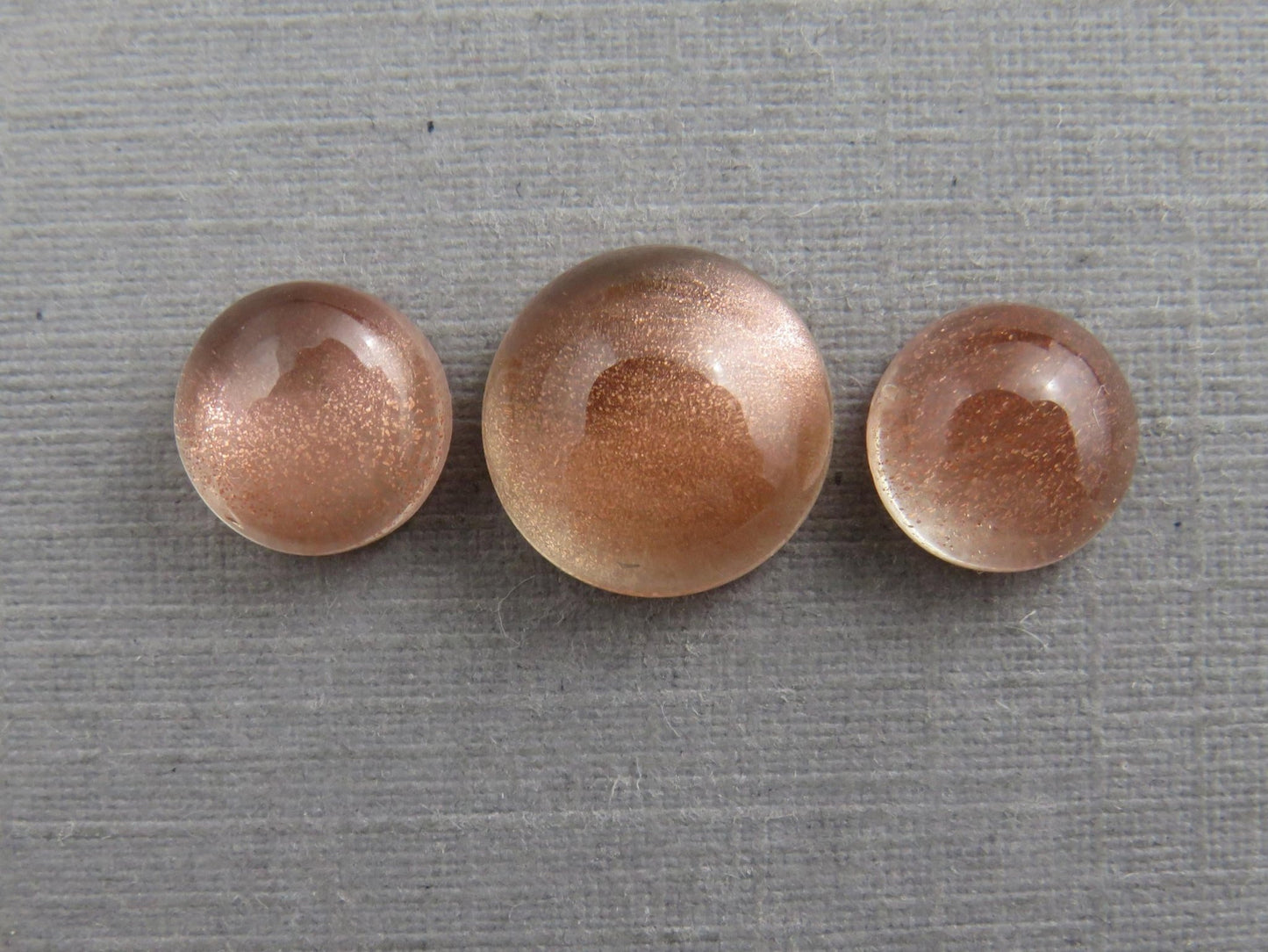 Oregon Sunstones Cabochon Set | 7mm pair and 9mm single Round Gemstones | 5.7 carats | OSC331 - Gem Enthusiast