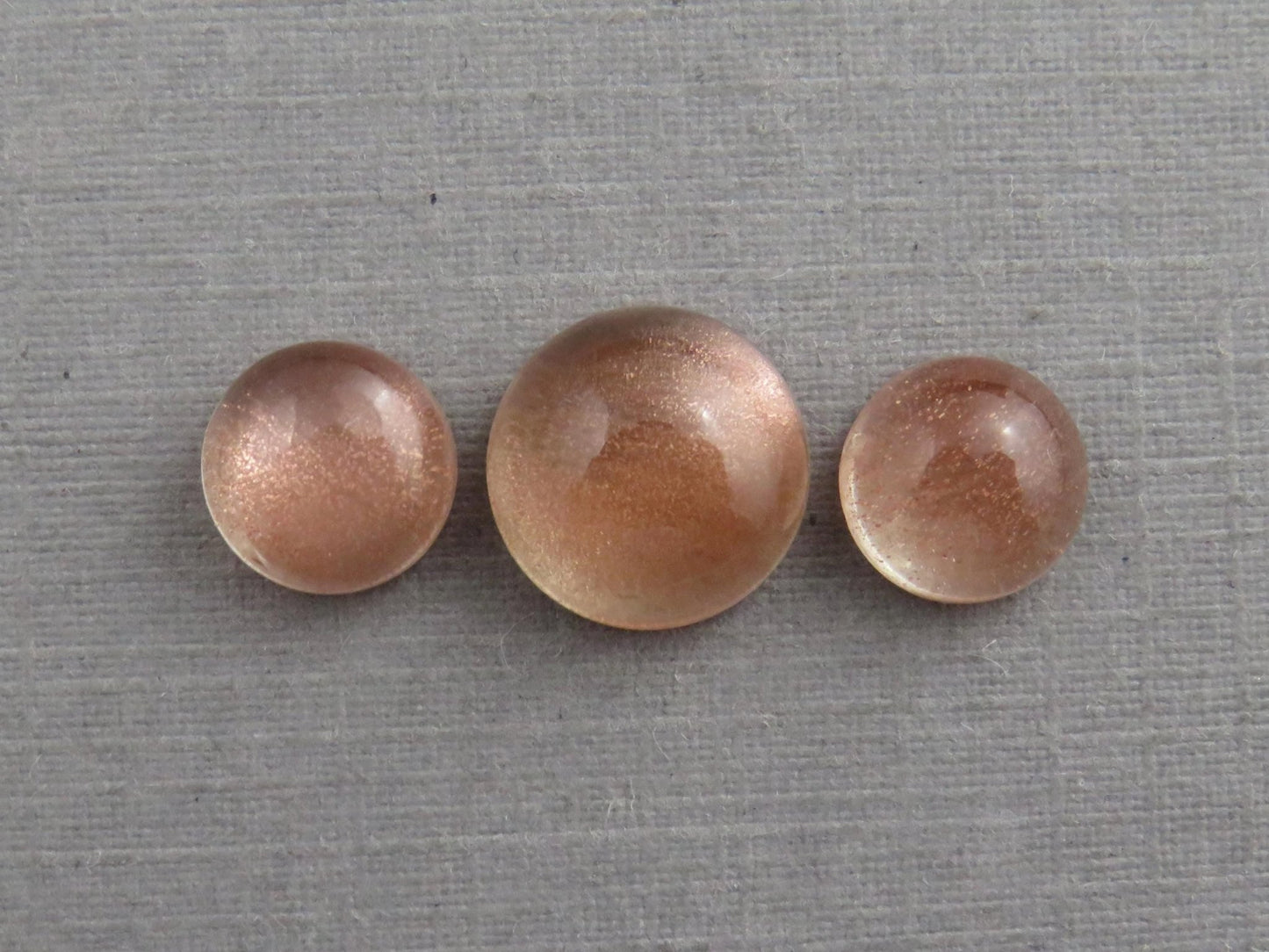 Oregon Sunstones Cabochon Set | 7mm pair and 9mm single Round Gemstones | 5.7 carats | OSC331 - Gem Enthusiast