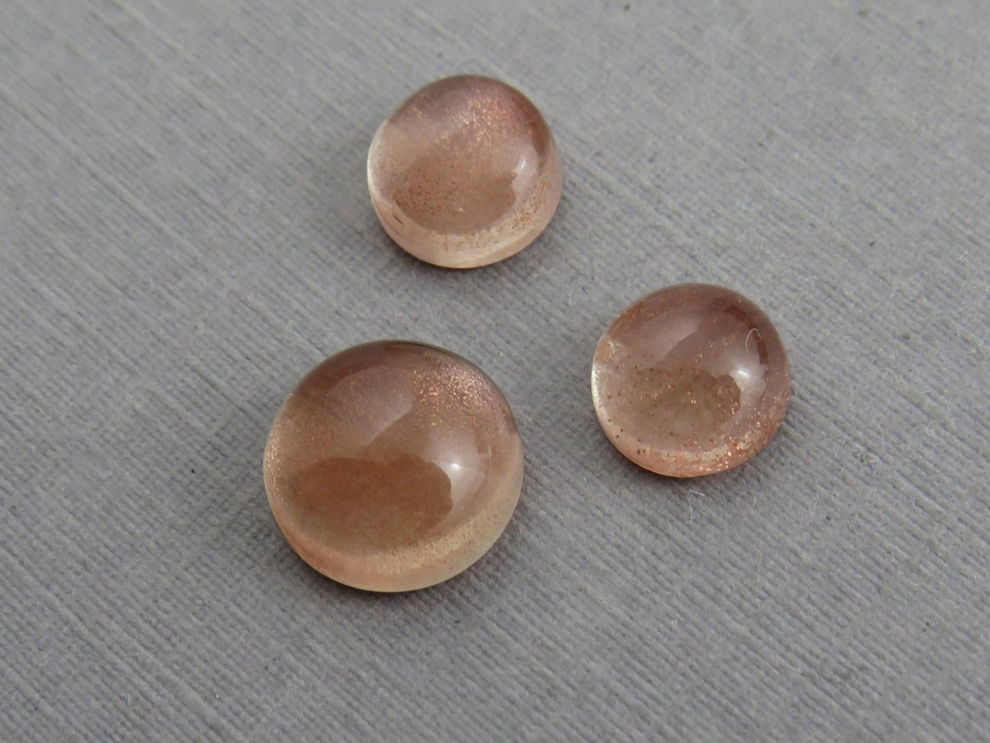 Oregon Sunstones Cabochon Set | 7mm pair and 9mm single Round Gemstones | 5.7 carats | OSC331 - Gem Enthusiast