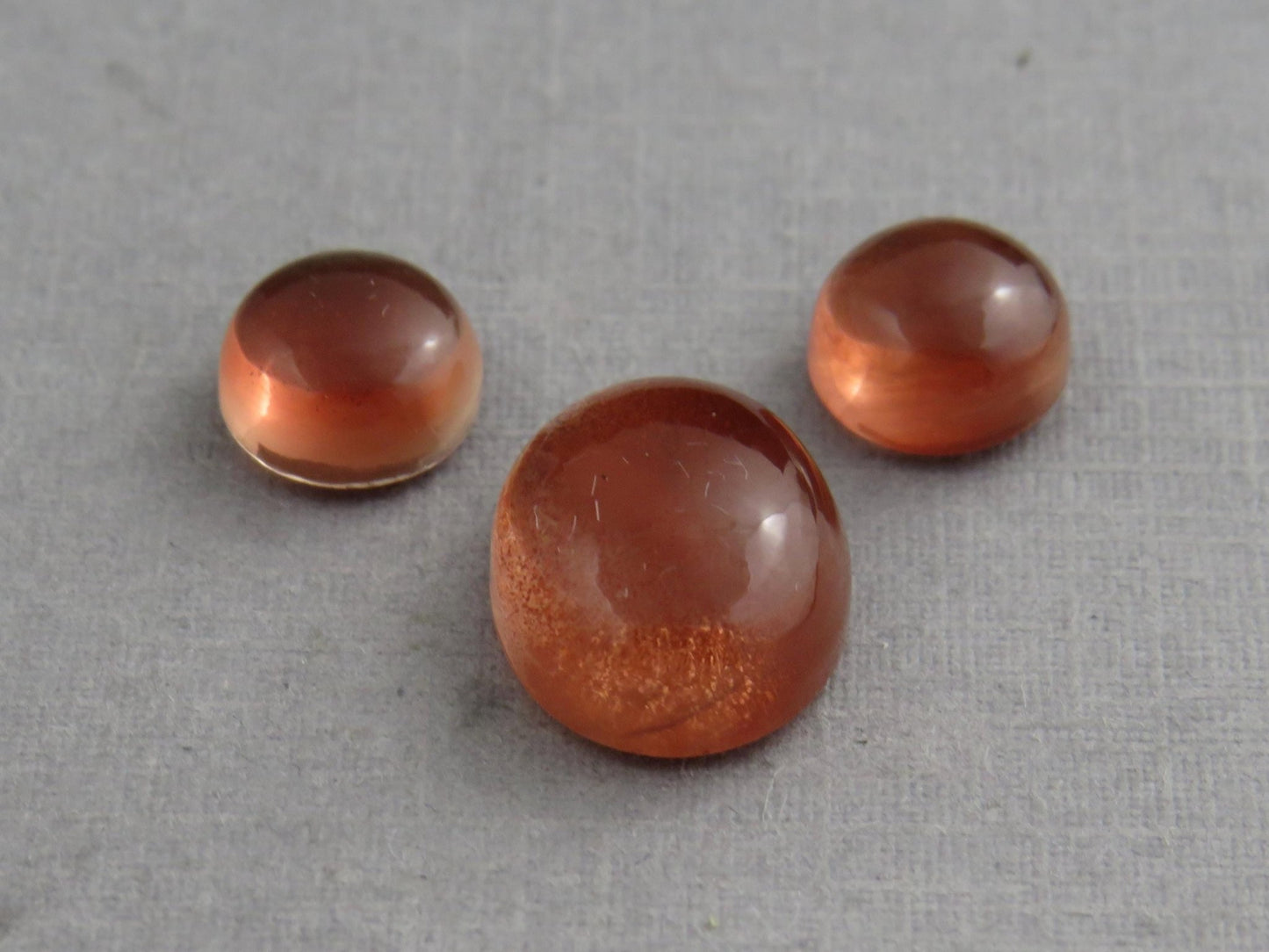Oregon Sunstones Oval Cabochon Set | 7x7 pair and 11x9 single | 7+ carats | OSC332 - Gem Enthusiast