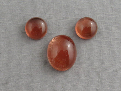 Oregon Sunstones Oval Cabochon Set | 7x7 pair and 11x9 single | 7+ carats | OSC332 - Gem Enthusiast