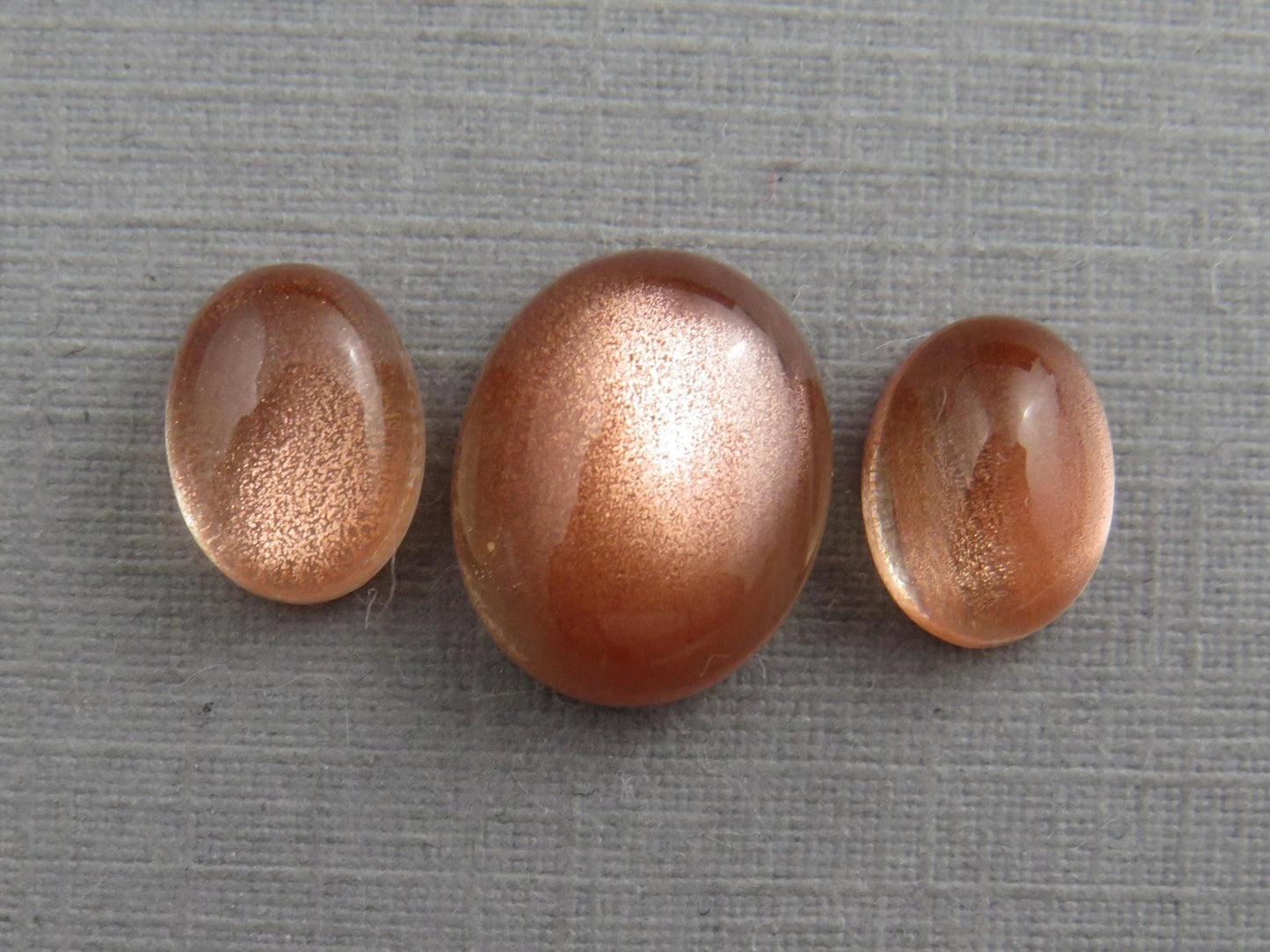 Oregon Sunstones Oval Cabochon Set | 8x6 pair and 11x9 single | 7 carats | OSC330 - Gem Enthusiast
