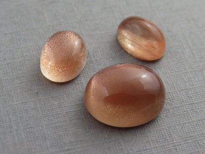 Oregon Sunstones Oval Cabochon Set | 8x6 pair and 11x9 single | 7 carats | OSC330 - Gem Enthusiast