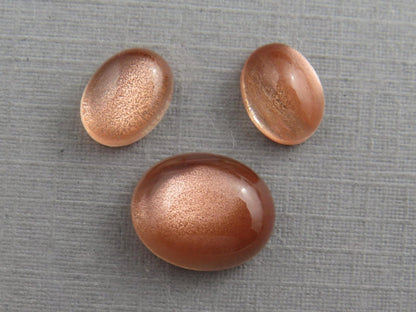 Oregon Sunstones Oval Cabochon Set | 8x6 pair and 11x9 single | 7 carats | OSC330 - Gem Enthusiast