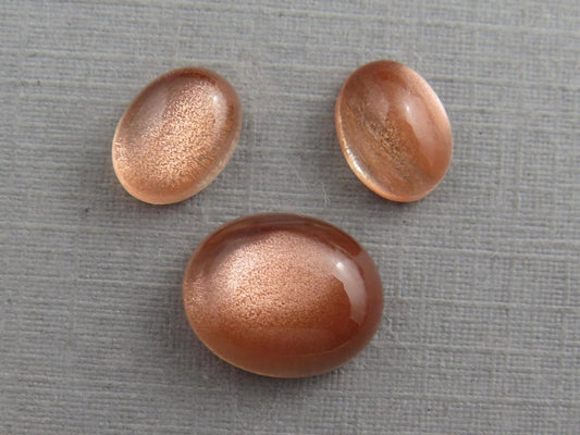 Oregon Sunstones Oval Cabochon Set | 8x6 pair and 11x9 single | 7 carats | OSC330 - Gem Enthusiast