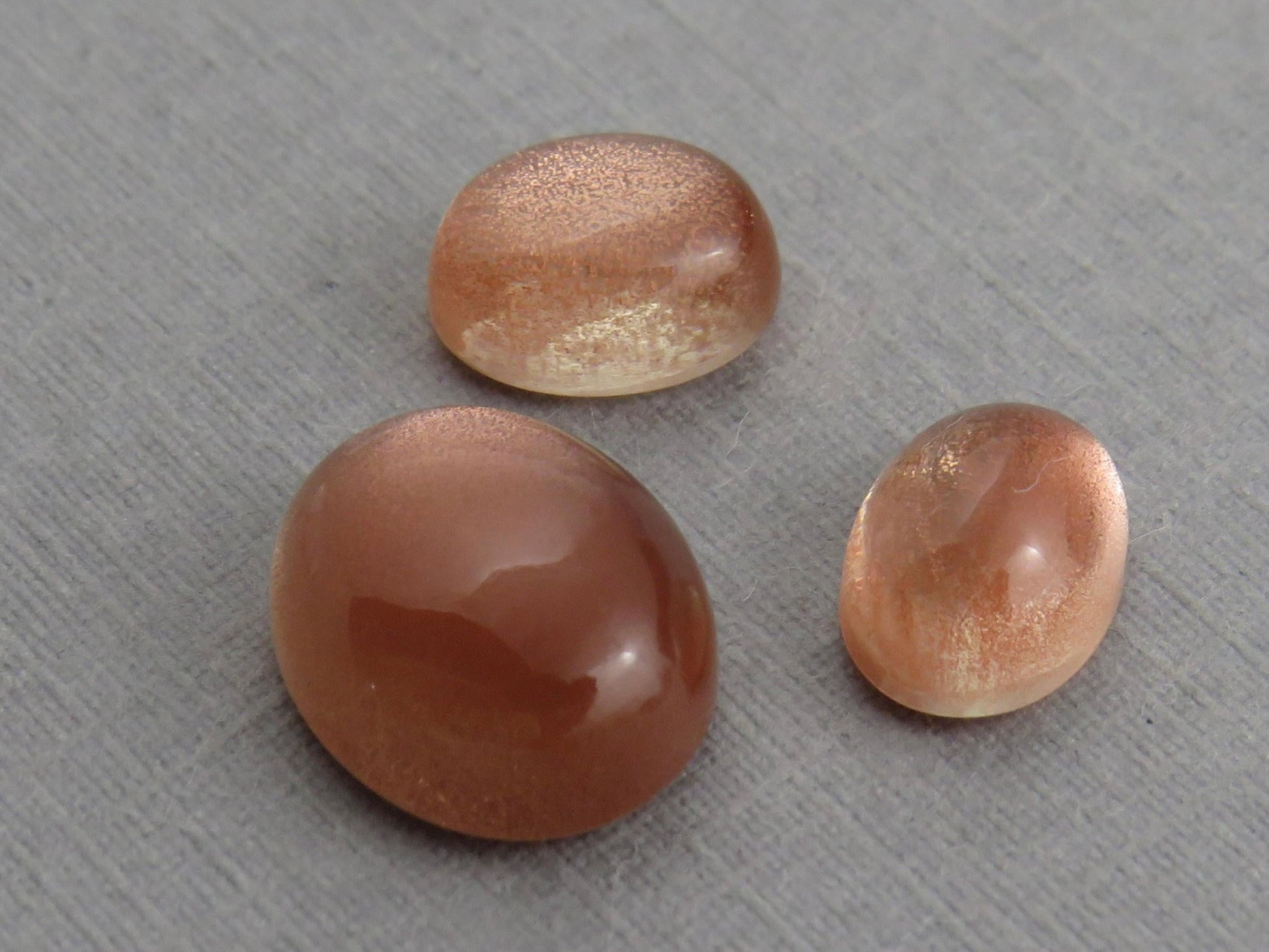 Oregon Sunstones Oval Cabochon Set | 8x6 pair and 11x9 single | 7 carats | OSC330 - Gem Enthusiast