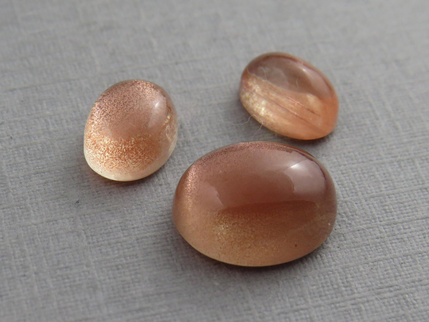 Oregon Sunstones Oval Cabochon Set | 8x6 pair and 11x9 single | 7 carats | OSC330 - Gem Enthusiast