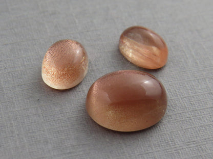 Oregon Sunstones Oval Cabochon Set | 8x6 pair and 11x9 single | 7 carats | OSC330 - Gem Enthusiast