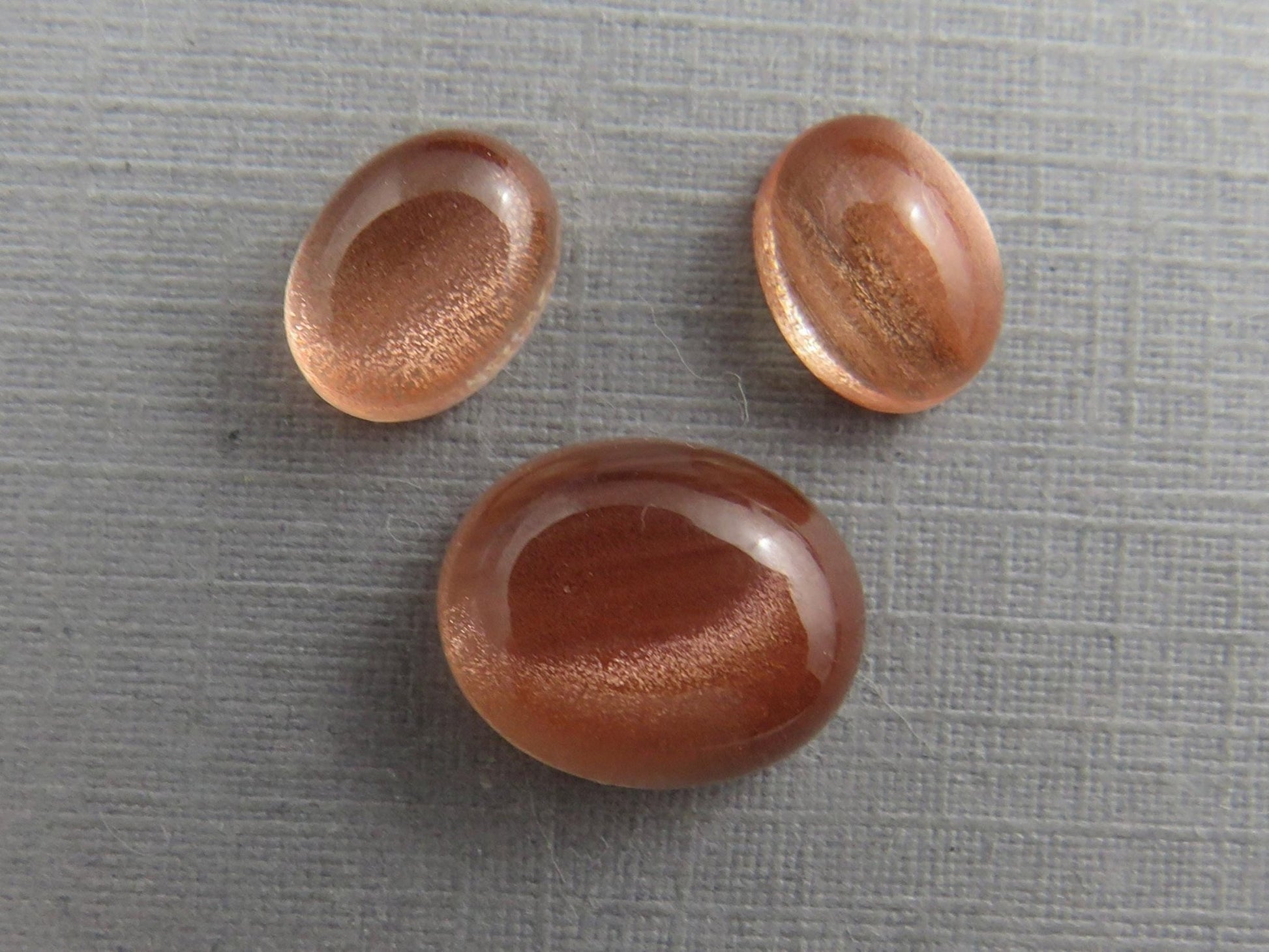Oregon Sunstones Oval Cabochon Set | 8x6 pair and 11x9 single | 7 carats | OSC330 - Gem Enthusiast