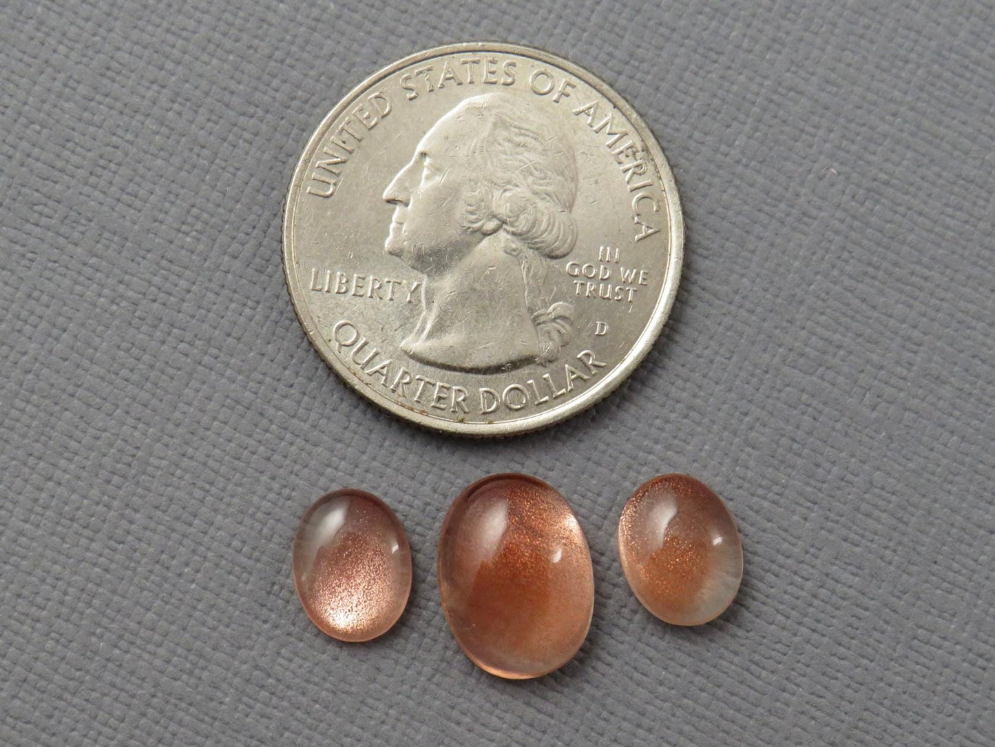 Oregon Sunstones Oval Cabochon Set | 9x7 pair and 12x9 single | 7.13 carats | OSC330 - Gem Enthusiast