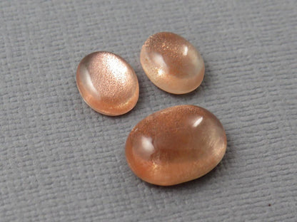 Oregon Sunstones Oval Cabochon Set | 9x7 pair and 12x9 single | 7.13 carats | OSC330 - Gem Enthusiast