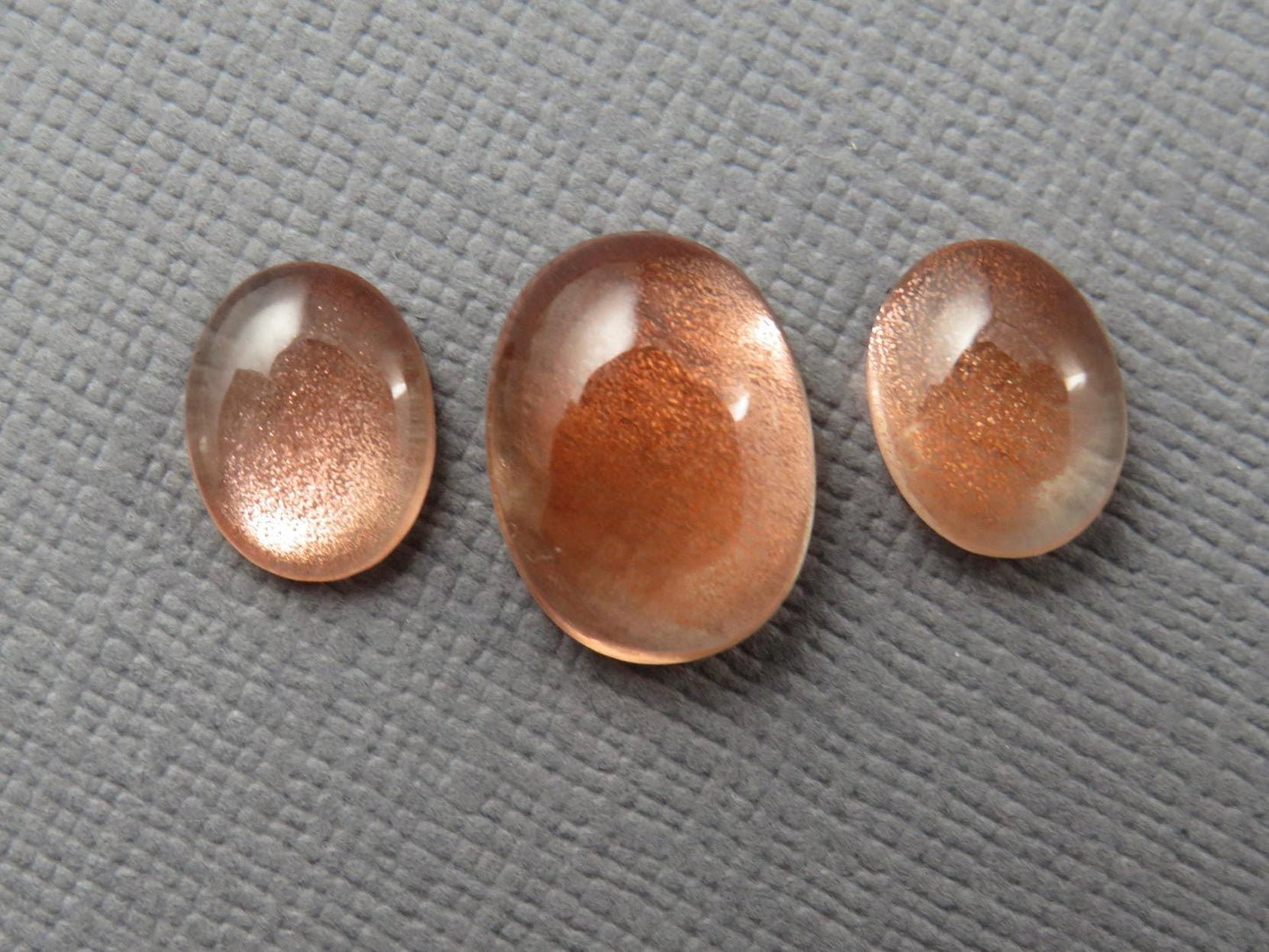 Oregon Sunstones Oval Cabochon Set | 9x7 pair and 12x9 single | 7.13 carats | OSC330 - Gem Enthusiast