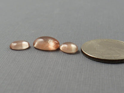 Oregon Sunstones Oval Cabochon Set | 9x7 pair and 12x9 single | 7.13 carats | OSC330 - Gem Enthusiast